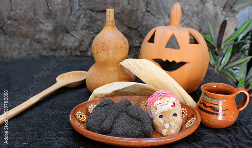Pan de muerto negro con cenizas de totomoxtle. Pan tradicional Mexicano para celebrar el día muertos. Inovadora creación de Texcoco, Mexico. photo