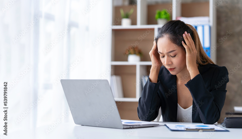tired business woman sleepy and bored from sitting at a desk for a long time and has office syndrome tired business woman sleepy and bored from sitting at a desk for a long time and has office syndrome