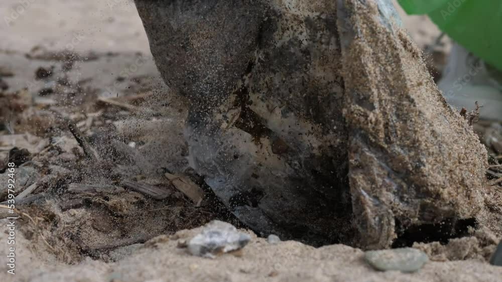 Plastic waste on the beach in the sand. Environmental pollution. Plastic waste on the beach in the sand. Environmental pollution.