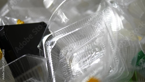 Background of plastic waste in the sorting center. Plastic products for recycling.