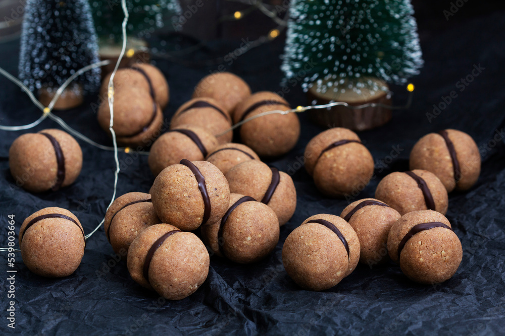 Lady's kisses, traditional Italian nut cookies with coffee and chocolate filling.