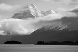 Grayscale shot of the snowy alps