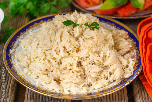 Rice pilaf / pilau cooked in broth with parsley