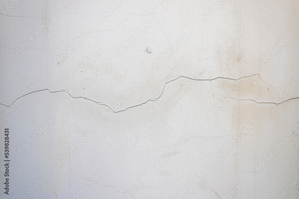 Fototapeta premium Texture of old dirty cracked white wall 