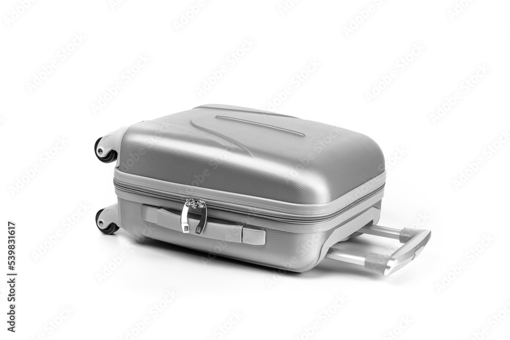 Travel suitcase isolated. Silver plastic luggage or vacation bag Travel suitcase isolated. Silver plastic luggage or vacation bag
