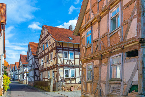 view to old medieval historic half timbered houses in Herleshausen, Germany