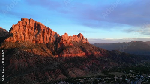 Aerial drone shot of Springdale, Utah at sunset.