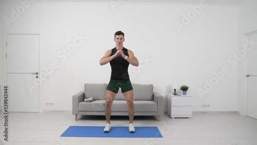 man athlete training squat sport. sport man athlete training squat. home sport training