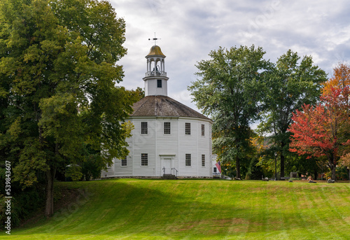 White old round church in the Vermont town of Richmond in the fall