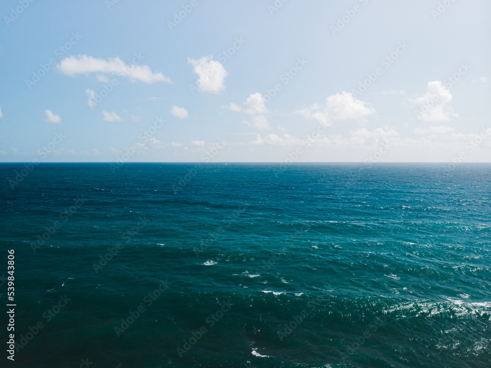 Blue ocean horizon landscape drone capture from the Caribbean tropical island puerto rico Blue ocean horizon landscape drone capture from the Caribbean tropical island puerto rico