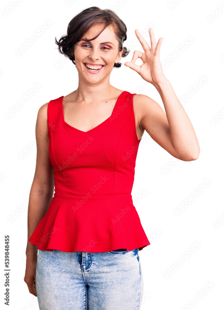 Beautiful young woman with short hair wearing casual style with sleeveless shirt smiling positive doing ok sign with hand and fingers. successful expression. Beautiful young woman with short hair wearing casual style with sleeveless shirt smiling positive doing ok sign with hand and fingers. successful expression.