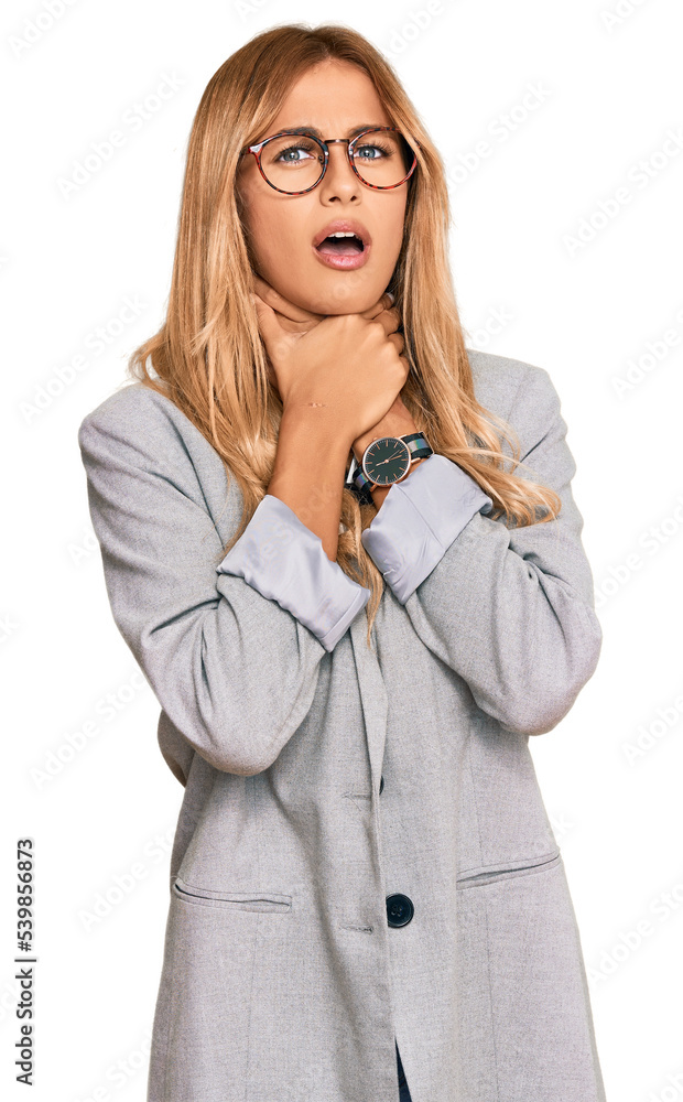 Beautiful blonde young woman wearing business clothes shouting suffocate because painful strangle. health problem. asphyxiate and suicide concept. Beautiful blonde young woman wearing business clothes shouting suffocate because painful strangle. health problem. asphyxiate and suicide concept.