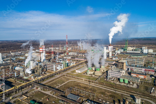Chemistry Factory in Lithuania  Achema in Jonava City. Clear Blue Sky and Smoke in background. Drone