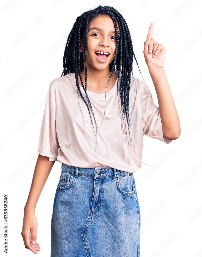 Cute african american girl wearing casual clothes pointing finger up with successful idea. exited and happy. number one. Cute african american girl wearing casual clothes pointing finger up with successful idea. exited and happy. number one.