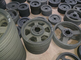 Pulleys of various sizes are stacked