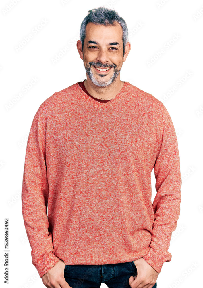 Middle age hispanic with grey hair wearing casual sweater with a happy and cool smile on face. lucky person. Middle age hispanic with grey hair wearing casual sweater with a happy and cool smile on face. lucky person.