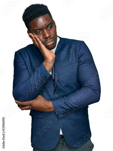 Handsome business black man wearing business suit and tie thinking looking tired and bored with depression problems with crossed arms.