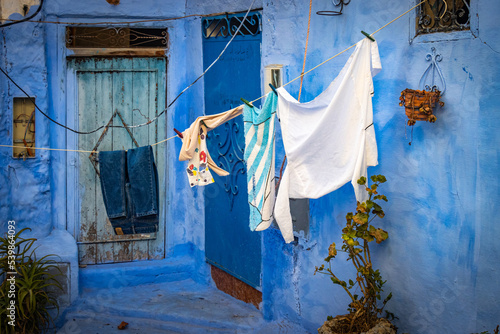 laundry drying on the clothesline, blue city of Chefchaouen, morocco, north africa © Andrea Aigner