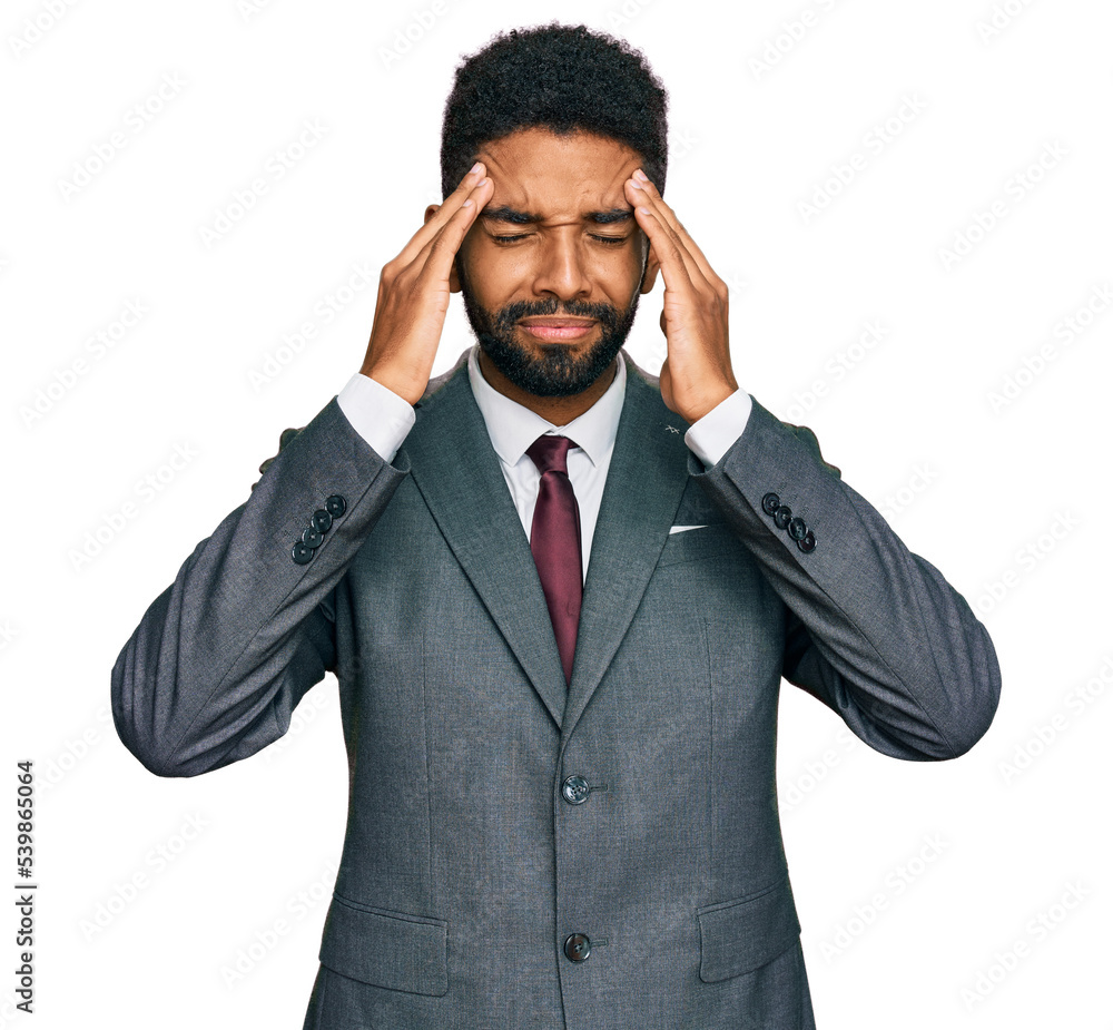 Young african american man wearing business clothes with hand on head for pain in head because stress. suffering migraine. Young african american man wearing business clothes with hand on head for pain in head because stress. suffering migraine.