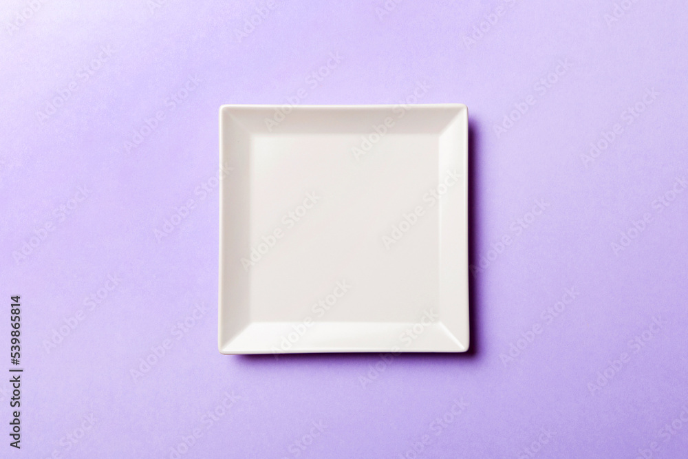 Top view of isolated of colored background empty square white plate for food. Empty dish with space for your design Top view of isolated of colored background empty square white plate for food. Empty dish with space for your design