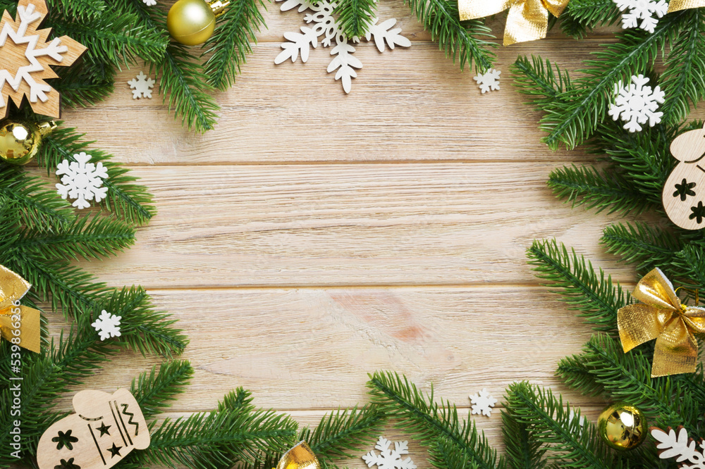 Christmas background with fir branches and Christmas decor. Top view, copy space for text