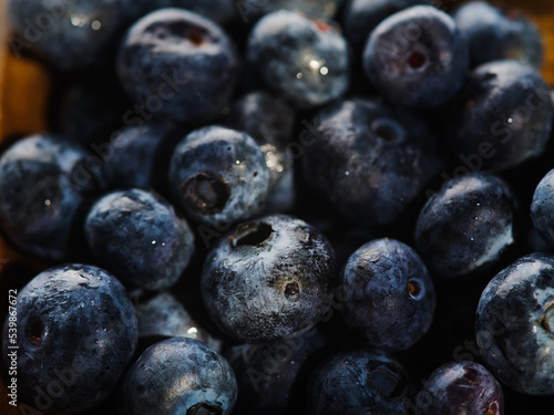 Close-up. Fresh blueberries. Lots of objects. A bountiful harvest. Farming and forestry, supermarket, culinary, medicine. There are no people in the photo. Background, wallpaper, texture.