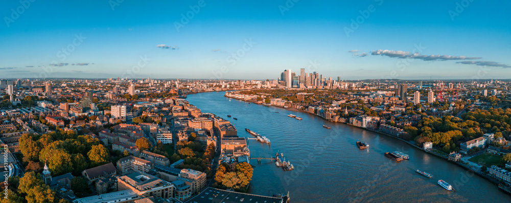 Aerial panoramic skyline view of Canary Wharf, the worlds leading financial district in London, UK. Business center of London.