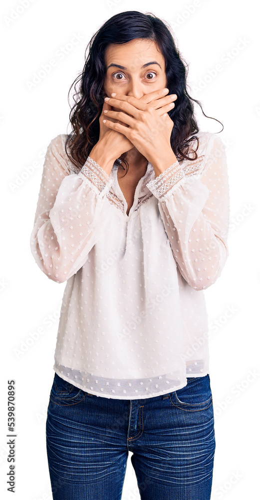 Young beautiful hispanic woman wearing casual clothes shocked covering mouth with hands for mistake. secret concept. Young beautiful hispanic woman wearing casual clothes shocked covering mouth with hands for mistake. secret concept.