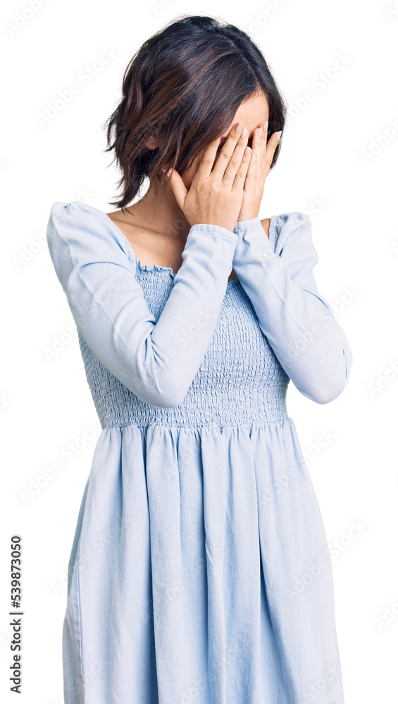 Young beautiful girl wearing casual clothes with sad expression covering face with hands while crying. depression concept. Young beautiful girl wearing casual clothes with sad expression covering face with hands while crying. depression concept.