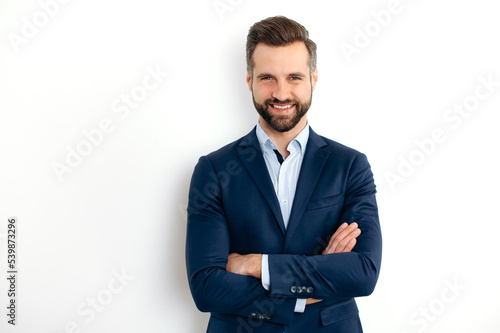 Fotobehang Portrait of a handsome positive caucasian successful bearded business man in a s
