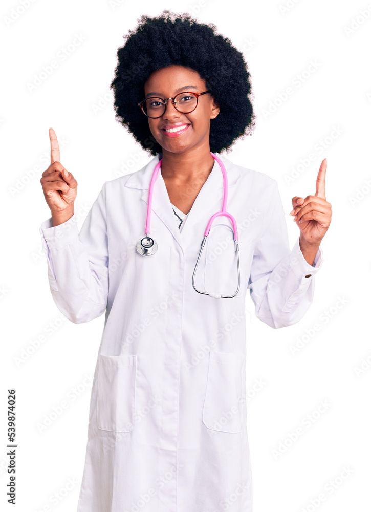 Young african american woman wearing doctor coat and stethoscope smiling confident pointing with fingers to different directions. copy space for advertisement Young african american woman wearing doctor coat and stethoscope smiling confident pointing with fingers to different directions. copy space for advertisement