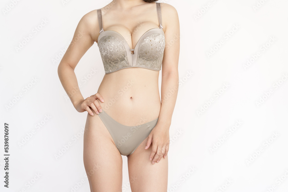 Obraz premium Skinny style underwear asian women wearing lingerie showing sexy body and beauty perfect skin. Women underwear high-waist panties and healthcare concept.