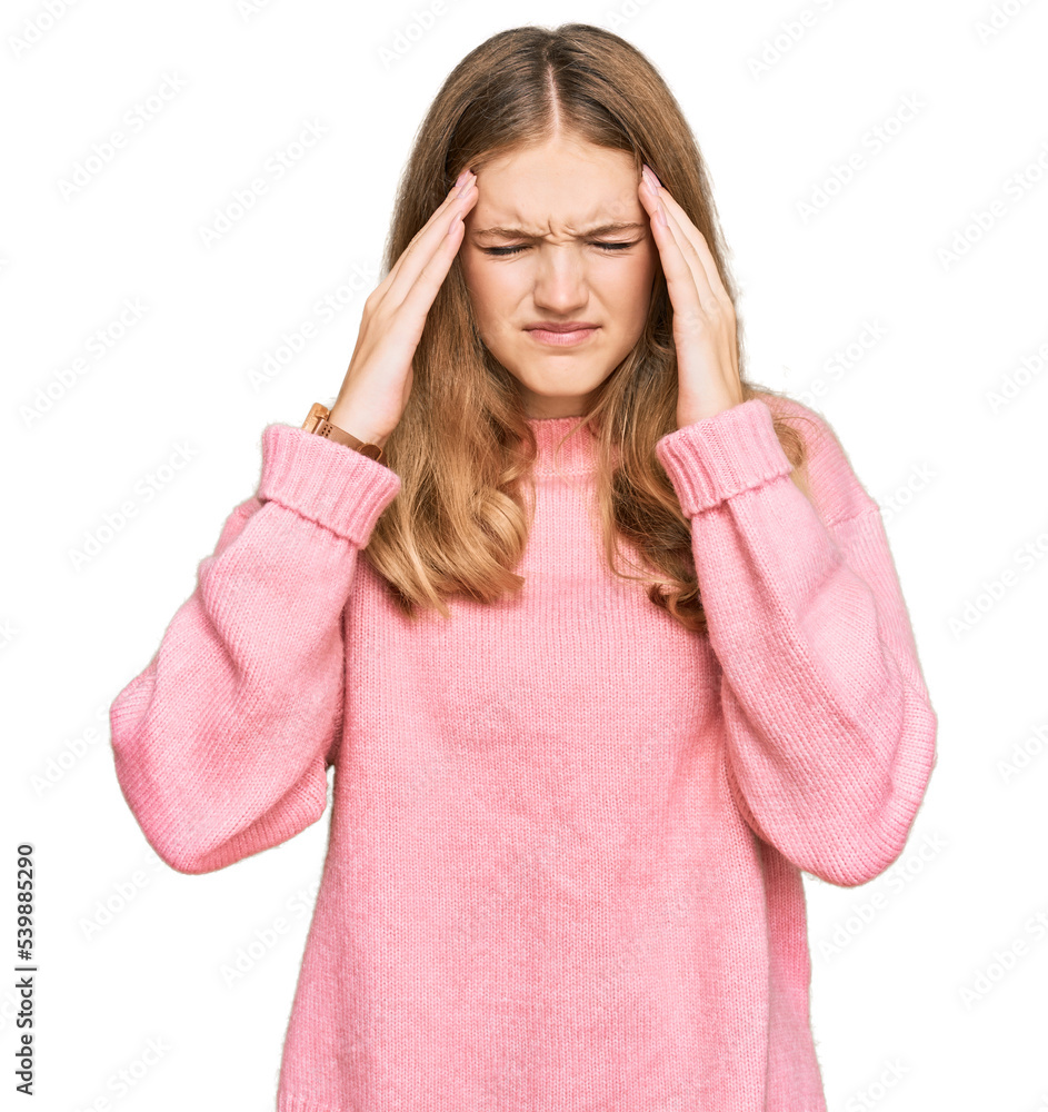 Beautiful young caucasian girl wearing casual winter sweater with hand on head for pain in head because stress. suffering migraine. Beautiful young caucasian girl wearing casual winter sweater with hand on head for pain in head because stress. suffering migraine.
