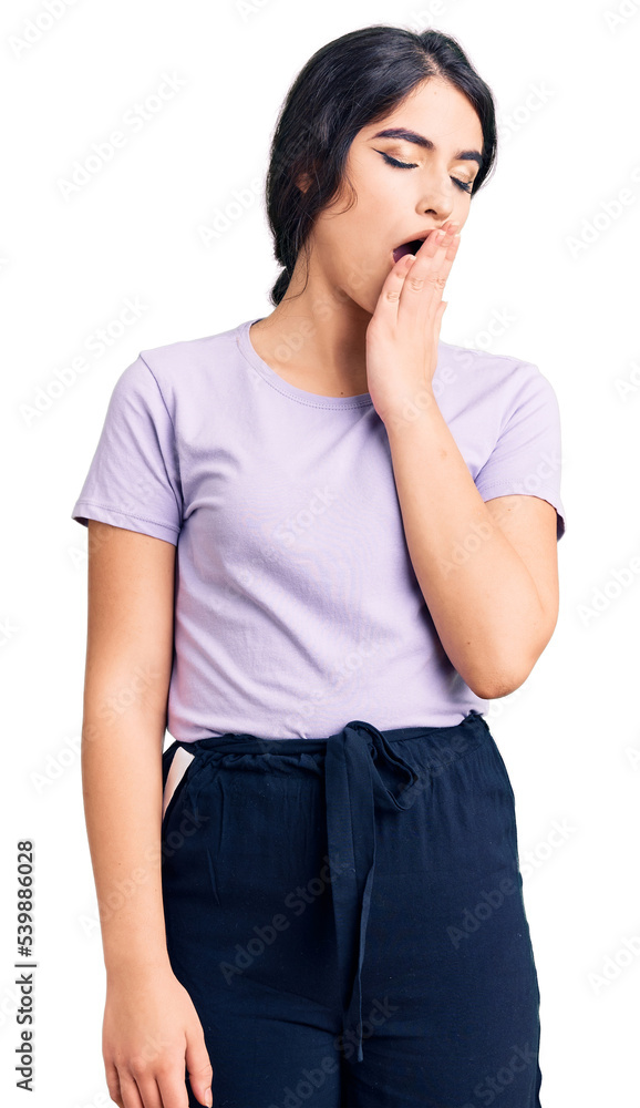 Brunette teenager girl wearing casual clothes bored yawning tired covering mouth with hand. restless and sleepiness. Brunette teenager girl wearing casual clothes bored yawning tired covering mouth with hand. restless and sleepiness.