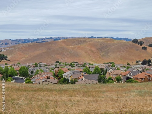 Homes and hills in Dougherty Valley near Livermore, California photo