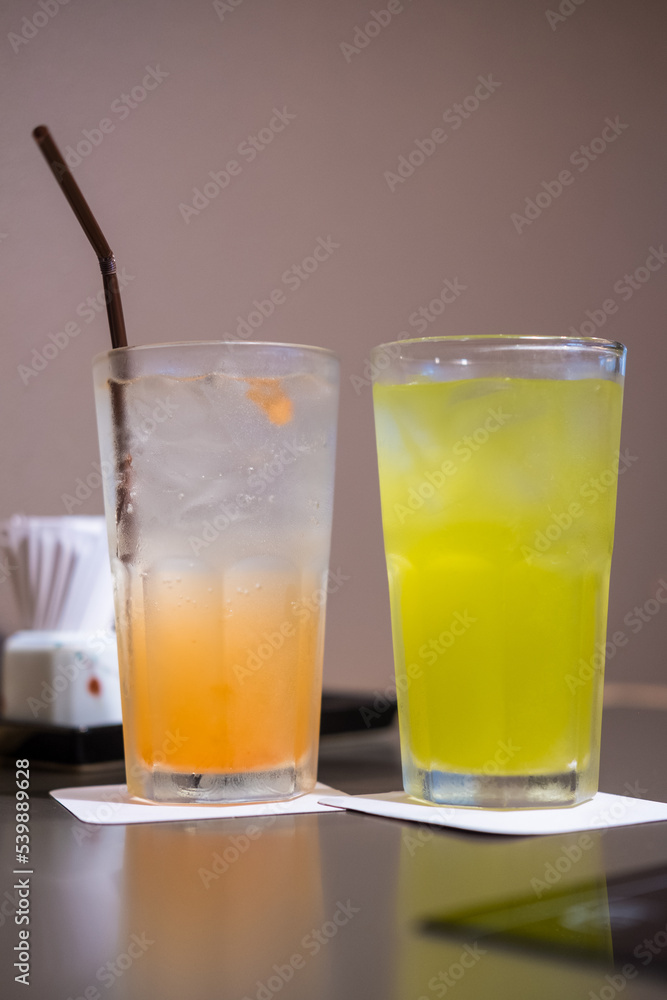 Iced plum Soda and iced green tea. Close up Iced plum Soda and iced green tea. Close up