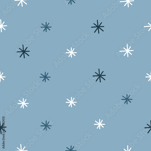 seamless pattern in Scandinavian style with snowflakes on a blue background. Vector illustration for your design