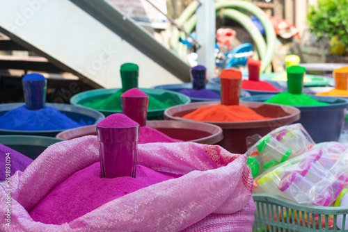 Wallpaper Mural Vibrant colors, rangoli, dyes glass filled  in tub on street for sale during festivals of Holi, Diwali. Design colorful, lakshmi pooja, worship, symbolize, prosperity, handmade, organic, home entrance Torontodigital.ca