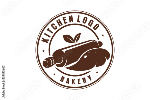 Bakery kitchen rolling pin logo design batter cake kitchen restaurant handmade vector
