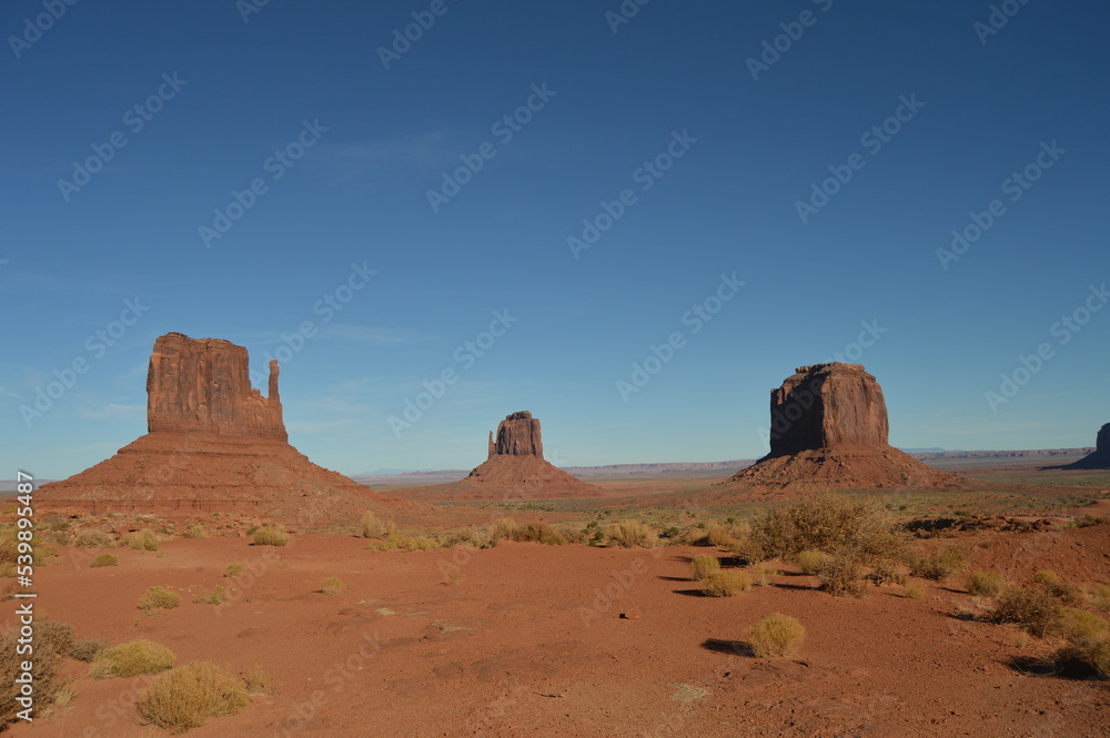Midday view of the Mitten Buttes at Utah's Monument Valley Midday view of the Mitten Buttes at Utah's Monument Valley