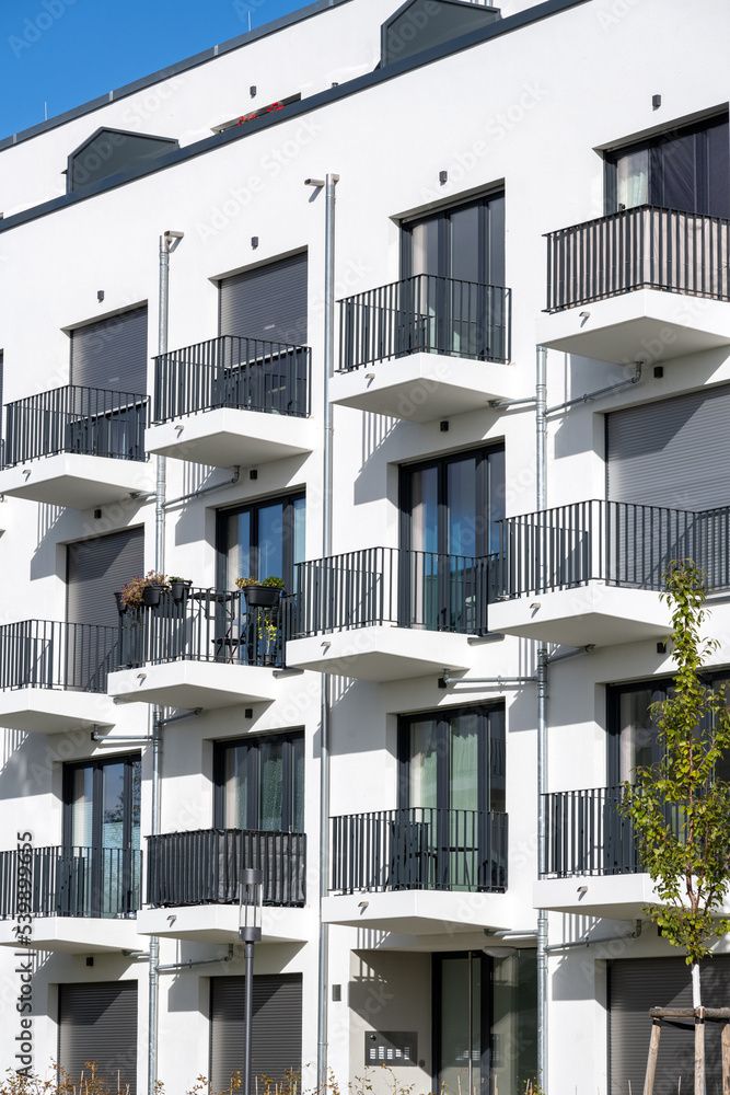 New apartment buildings with many small balconies seen in Berlin ...