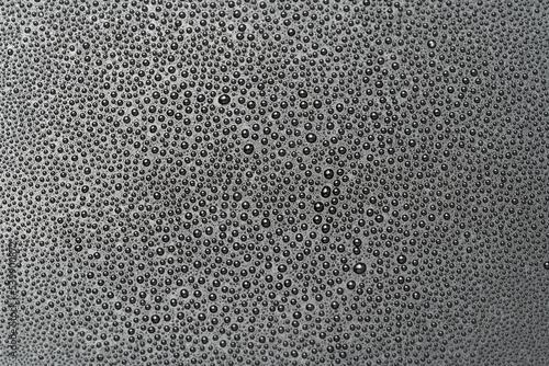 Water drops on a black background close-up