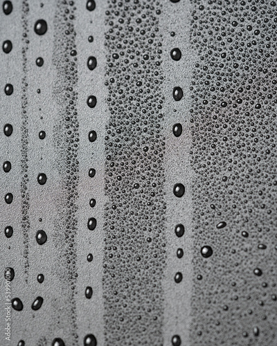 Water drops on a black background close-up