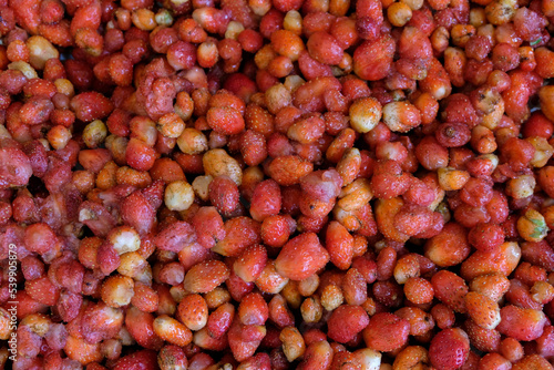 Isolated red, ripe, and delicious strawberries, freshly picked from farm, ready to be washed and made into strawberry jam, close up of fresh fruit berries