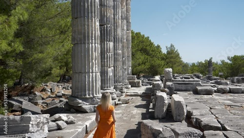 View of historical ruins, columns, ancient theater and temples in the ancient city of Priene. photo