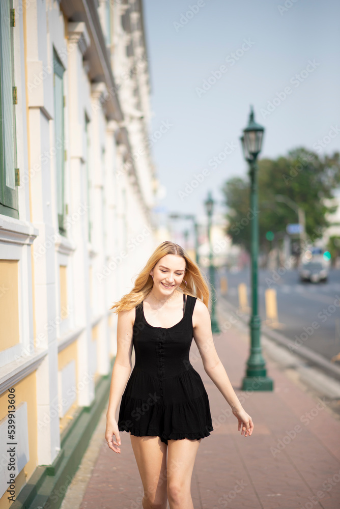 Beautiful model young woman enjoyment street portrait.