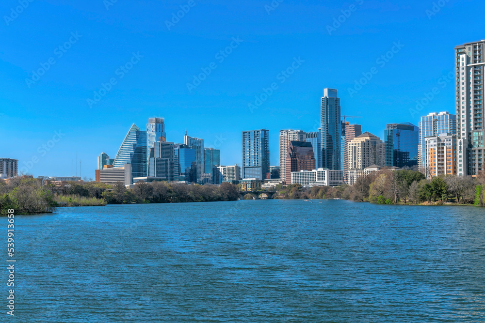 Naklejka premium Scenic skyline of Austin Texas with modern luxury apartments and Colorado River