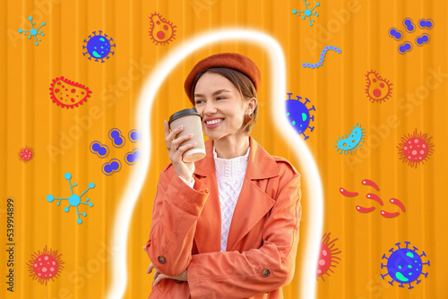 Beautiful young woman with coffee on yellow background. Concept of strong immunity