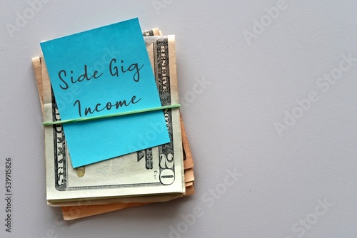 Принти на полотні Dollars cash money with handwritten note SIDE GIG INCOME on white background - c
