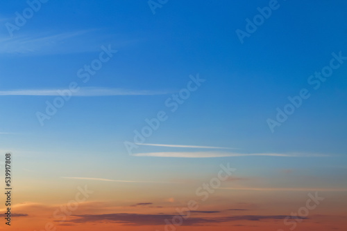 Blue sky with wispy clouds ...